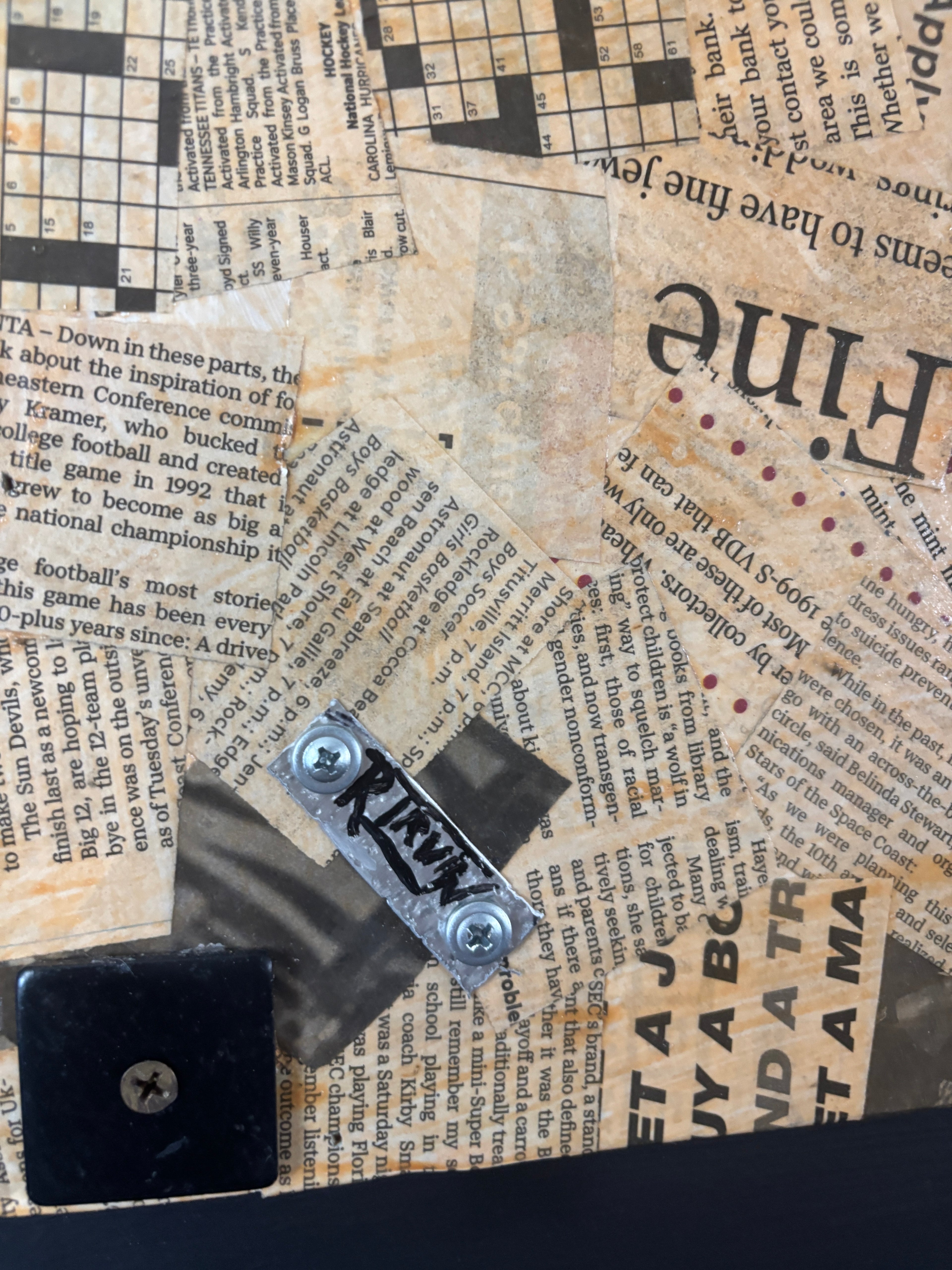 Balance of Life — close-up of newsprint collage background with dragon detail by Rita Irvin