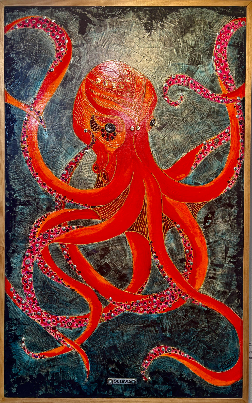 Octavia — close-up of octopus head with carved wood detail and bolts by Rita Irvin