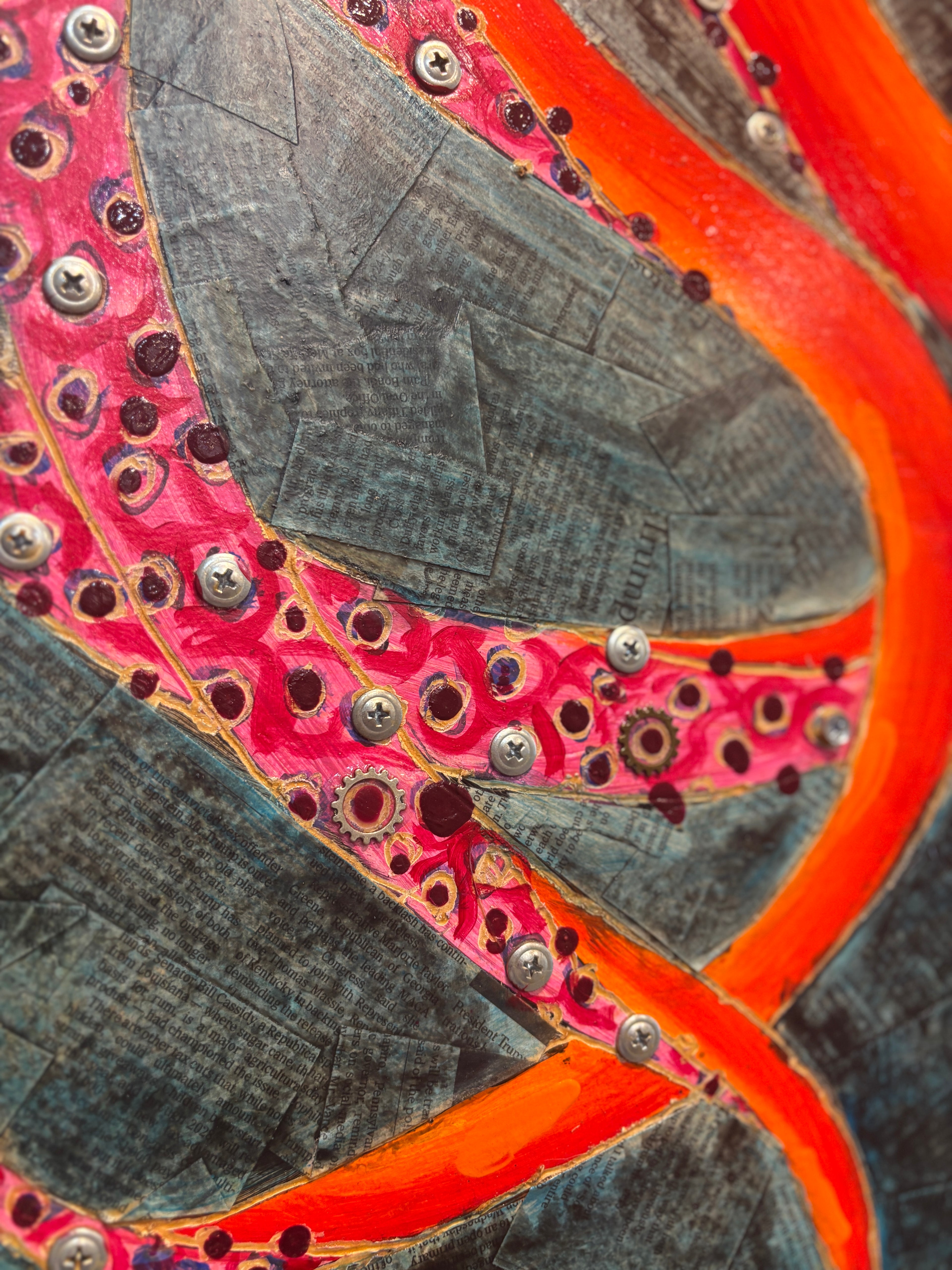 Octavia — detail of newspaper collage background and OCTAVIA name plate on wood by Rita Irvin
